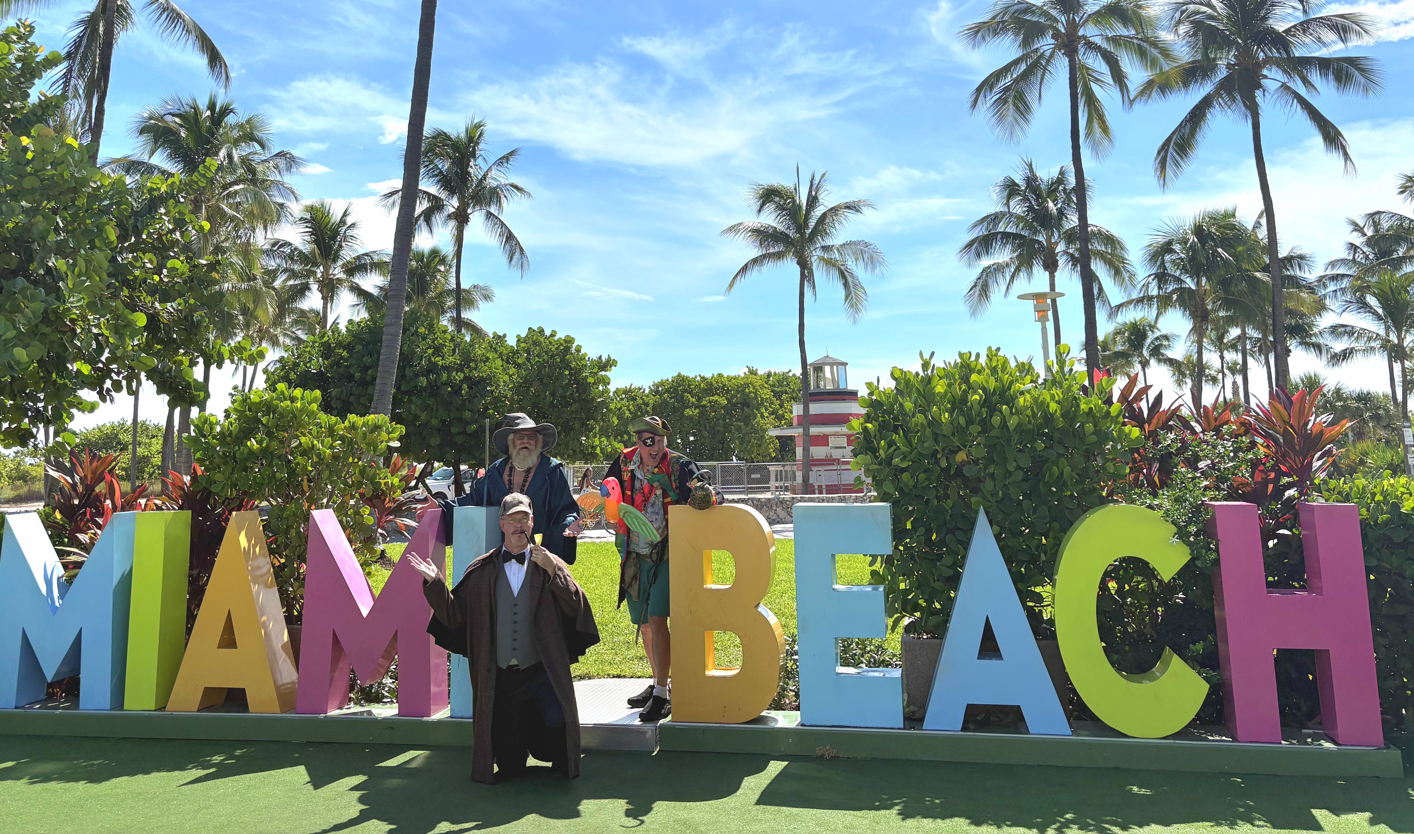 murder mystery actors posing in Miami during the Premier Destinations tour